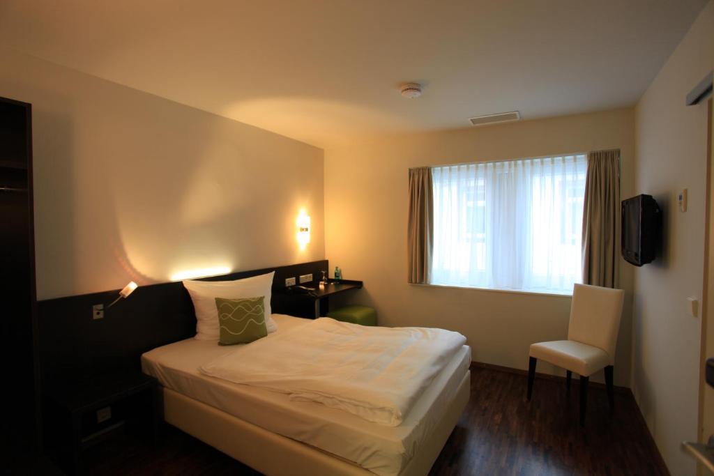 Art Hotel Lauterbach Kaiserslautern Oda fotoğraf